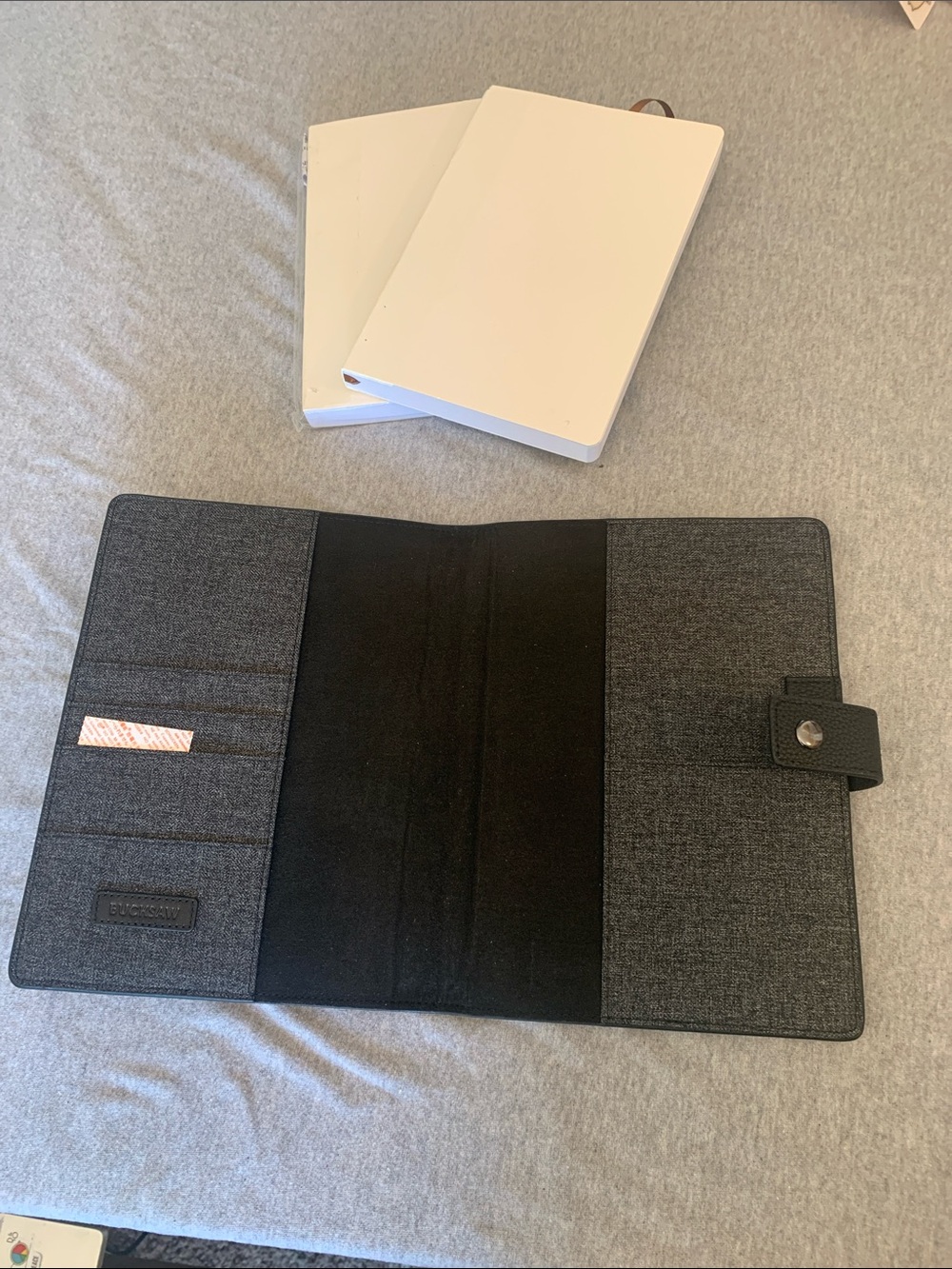 Bucksaw leather notebook & two filler notebooks.